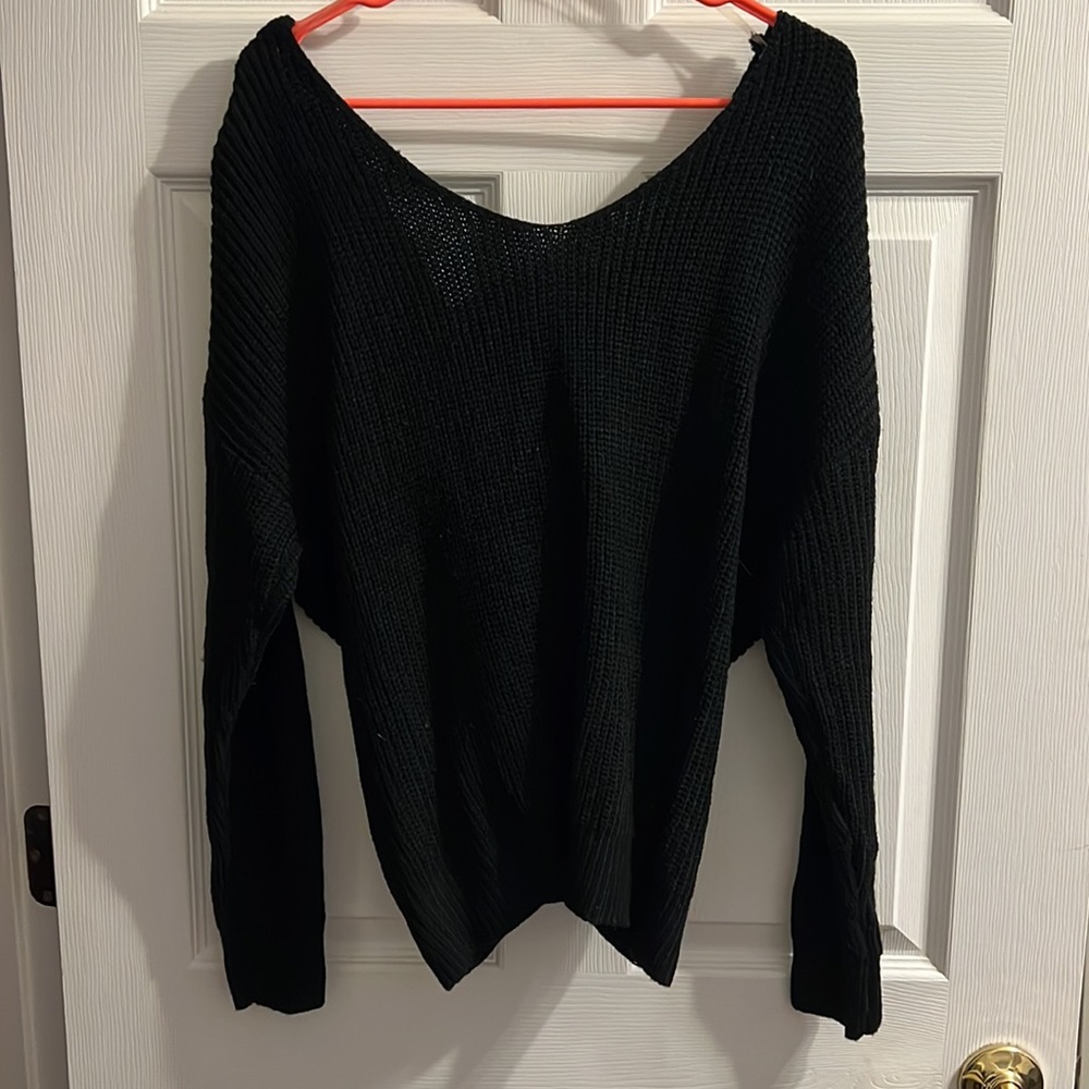 Black sweater with knot detail in back